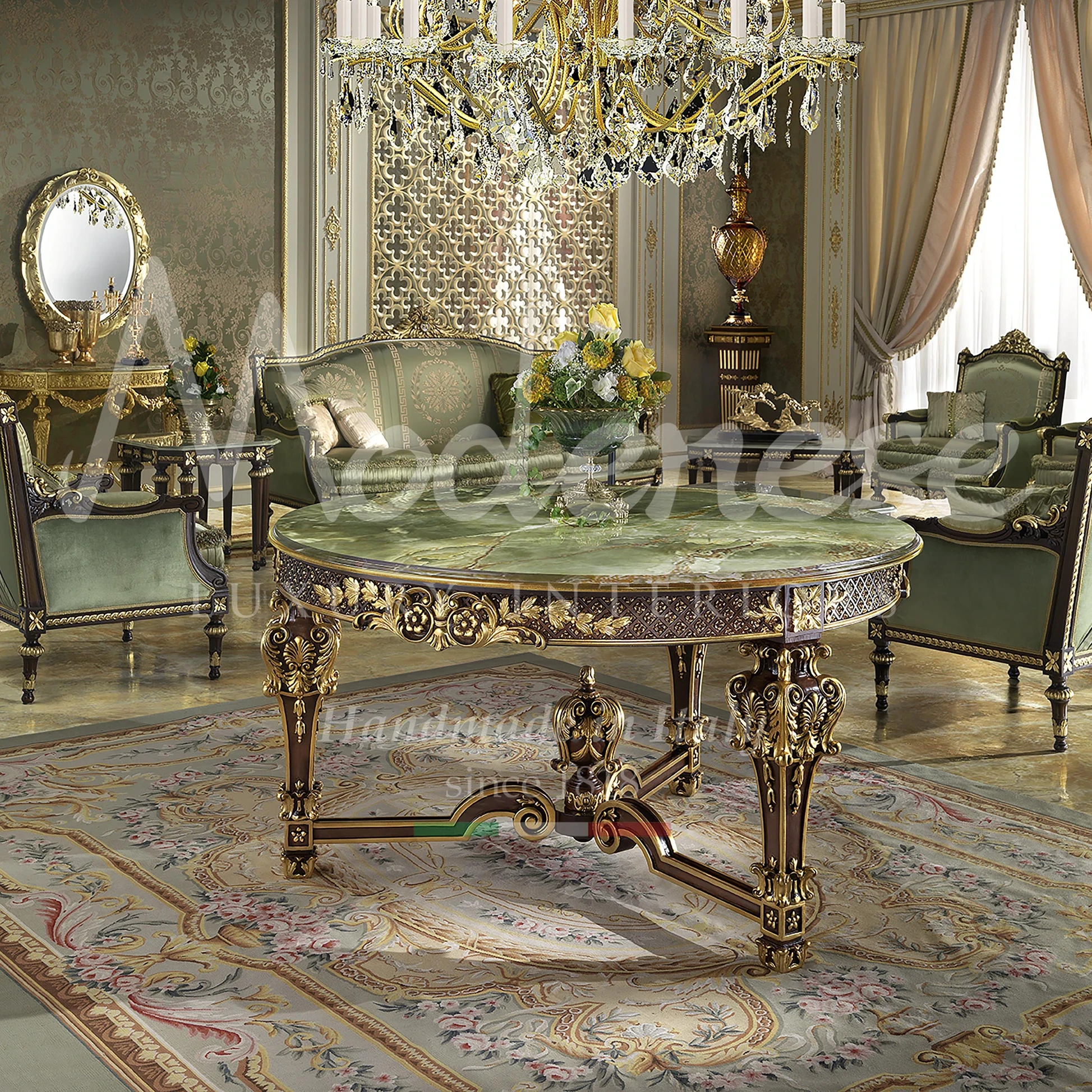 Green marble round entrance table with carved Baroque legs for a classic Los Angeles villa created by Modenese Interiors.